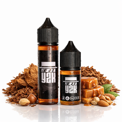 Vape liquid by The Legal Factory E-Juice featuring Y2K tobacco with caramel and crushed nuts in a clear bottle.